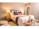 Comfortable bedroom with stylish decor, featuring a large bed, bedside tables, and cozy rug at 836 Wood Nw St, Atlanta, GA 30318