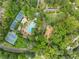 A captivating aerial view of the community amenities, including tennis courts, pool, and playground at 916 Stratford Rd, Avondale Estates, GA 30002