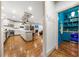 Open kitchen with a large island flows into a butler's pantry with custom shelving, cabinetry, and a beverage cooler at 916 Stratford Rd, Avondale Estates, GA 30002