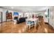 Expansive living area with hardwood floors, grand piano, and natural light at 916 Stratford Rd, Avondale Estates, GA 30002