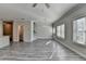 Open living area with wood-look floors, natural light and kitchen access at 4421 Fulson Dr, Lilburn, GA 30047