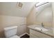 Bathroom showcasing granite countertops and a crisp white toilet and vanity at 6223 Marbut Farms Ln, Lithonia, GA 30058
