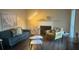 Cozy living room with modern decor and a fireplace at 6223 Marbut Farms Ln, Lithonia, GA 30058