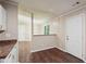 Open-concept living area showcasing seamless flow between kitchen and dining spaces at 6223 Marbut Farms Ln, Lithonia, GA 30058