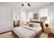 Bright bedroom with hardwood floors, large windows and closet access provides comfort and convenience at 653 N Highland Ne Ave # 5, Atlanta, GA 30306