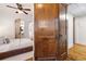 Bedroom featuring hardwood floors, ample natural light, and access to an ensuite bathroom at 653 N Highland Ne Ave # 5, Atlanta, GA 30306