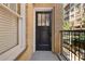 Apartment number 5, black front door with yellow brick and black railings at 653 N Highland Ne Ave # 5, Atlanta, GA 30306