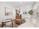 Open concept living room showcasing hardwood floors, modern decor, and ample natural light at 653 N Highland Ne Ave # 5, Atlanta, GA 30306