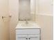 Compact bathroom featuring a modern vanity with storage at 7186 Raintree Loop, Jonesboro, GA 30236