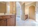 Bathroom featuring a vanity with storage cabinets and tiled floors at 308 Rusty Gate Pass, Woodstock, GA 30189