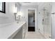 Bright bathroom with glass shower, subway tile and quartz countertops at 3376 Peachtree Rd # 1, Atlanta, GA 30326