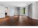 Expansive bedroom featuring hardwood floors, natural light, and ample space at 3376 Peachtree Rd # 1, Atlanta, GA 30326