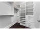 Organized walk-in closet with shelves, drawers, and ample storage space at 3376 Peachtree Rd # 1, Atlanta, GA 30326