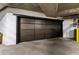 View of a garage with a large door for multiple cars at 3376 Peachtree Rd # 1, Atlanta, GA 30326
