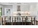 Bright kitchen with white cabinetry, a marble island, and stainless steel appliances at 3376 Peachtree Rd # 1, Atlanta, GA 30326