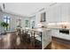 Modern kitchen with a large marble island, white cabinets, and stainless steel appliances, perfect for culinary enthusiasts at 3376 Peachtree Rd # 1, Atlanta, GA 30326