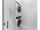 Conveniently stacked washer and dryer in a modern laundry room at 3376 Peachtree Rd # 1, Atlanta, GA 30326