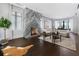 Elegant living room featuring a marble fireplace, hardwood floors, and stylish furniture at 3376 Peachtree Rd # 1, Atlanta, GA 30326