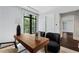 Serene office space with desk, comfortable seating, natural light, and view to trees at 3376 Peachtree Rd # 1, Atlanta, GA 30326