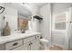 Stylish bathroom with a marble countertop vanity and a shower-tub combination at 4440 Atwood Dr, Cumming, GA 30040