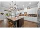 Gourmet kitchen with a center island, stainless appliances, and granite countertops at 4440 Atwood Dr, Cumming, GA 30040