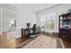 Bright office with hardwood floors, window, neutral walls, computer desk, and bookshelf at 4440 Atwood Dr, Cumming, GA 30040