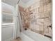 Shower area featuring tile surround and built in niche at 4440 Atwood Dr, Cumming, GA 30040