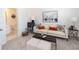 Stylish living room with comfortable seating, modern décor, a nearby bathroom, and bright natural light at 506 Healy Dr # 74, Cumming, GA 30040