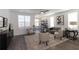 Inviting living room with natural light, a cozy sofa, and elegant decor at 506 Healy Dr # 74, Cumming, GA 30040