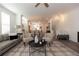Open living space with a dining area, neutral tones, and contemporary furnishings at 506 Healy Dr # 74, Cumming, GA 30040