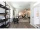 Open living space with modern decor, wood flooring, and ample natural light at 506 Healy Dr # 74, Cumming, GA 30040