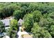 Aerial view of a house and surrounding dense foliage at 55 Bransford Rd, Sandy Springs, GA 30324