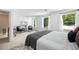 Spacious bedroom with neutral colors, large windows, and comfortable bed at 55 Bransford Rd, Sandy Springs, GA 30324
