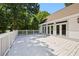 Spacious white deck provides access to a home with multiple French doors at 55 Bransford Rd, Sandy Springs, GA 30324