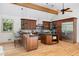 Stylish kitchen with granite countertops, stainless steel appliances, and a breakfast bar with seating at 55 Bransford Rd, Sandy Springs, GA 30324