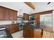 Modern kitchen featuring stainless steel appliances, a center island, and granite countertops at 55 Bransford Rd, Sandy Springs, GA 30324