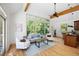 Bright open living room with large windows and comfortable seating area at 55 Bransford Rd, Sandy Springs, GA 30324