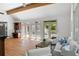 Bright living room boasts hardwood floors, natural light and direct access to outdoor patio at 55 Bransford Rd, Sandy Springs, GA 30324