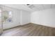 Bright room features modern wood-look flooring and natural light from a large window at 55 Bransford Rd, Sandy Springs, GA 30324