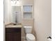 Traditional bathroom featuring a granite countertop and window at 651 Deer Springs Way, Loganville, GA 30052