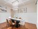 Elegant dining room with coffered ceiling, modern chandelier, and stylish decor at 651 Deer Springs Way, Loganville, GA 30052