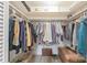 Spacious walk-in closet with shelving and hanging storage for optimal organization at 1111 Clairemont Ave # N3, Decatur, GA 30030