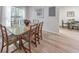Dining room featuring hardwood floors and ample lighting at 1111 Clairemont Ave # N3, Decatur, GA 30030