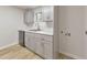 A kitchen with modern cabinets, stainless steel dishwasher, and light hardwood style floors at 1111 Clairemont Ave # N3, Decatur, GA 30030