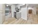 Updated kitchen featuring stainless steel appliances and stylish wood look vinyl flooring at 1111 Clairemont Ave # N3, Decatur, GA 30030
