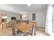 Living room and dining room featuring hardwood floors and ample lighting at 1111 Clairemont Ave # N3, Decatur, GA 30030