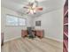 Bright office with a large desk, neutral color scheme, and light hardwood style floors at 1111 Clairemont Ave # N3, Decatur, GA 30030