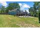 Expansive backyard features a fire pit, large deck and lush lawn, perfect for outdoor entertaining and relaxation at 429 Oakland Ave, Atlanta, GA 30312