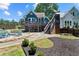 Beautiful backyard with deck, fire pit, and lush landscaping offering a relaxing outdoor experience at 429 Oakland Ave, Atlanta, GA 30312