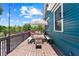 Relaxing deck with shaded dining area, blue siding, and string lights for evening ambiance at 429 Oakland Ave, Atlanta, GA 30312